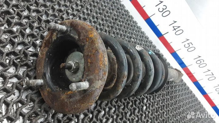 Стойка амортизатора переднего правого Mitsubishi M