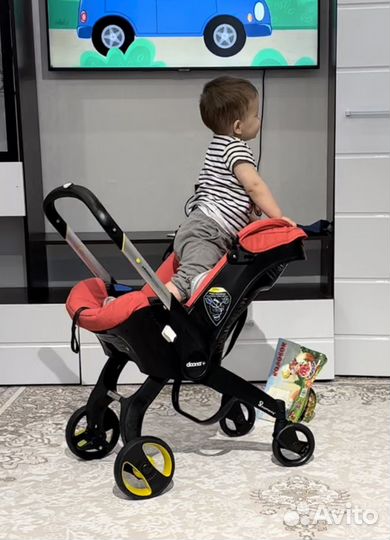 Коляска автокресло doona с базой isofix
