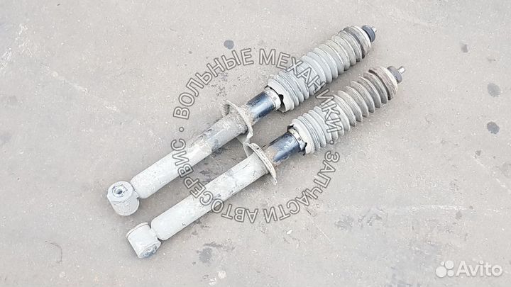 Задний амортизатор пружина на Ладу Калину