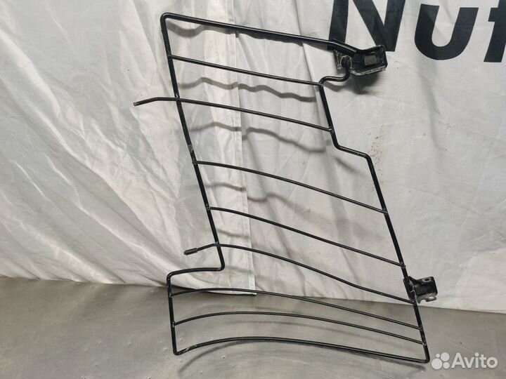 Решетка защитная левой фары Volvo FH