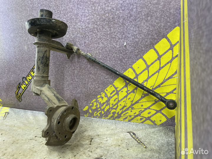 Кулак поворотный в сборе левый 16V Nexia Нексия