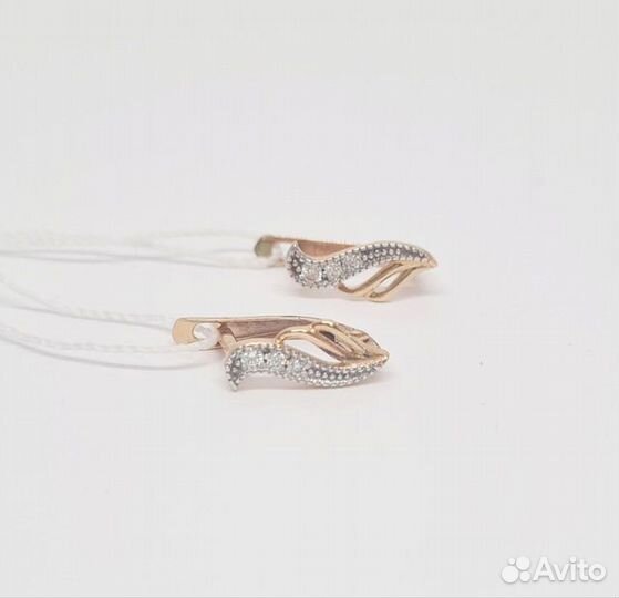 Золотые серьги с камнем