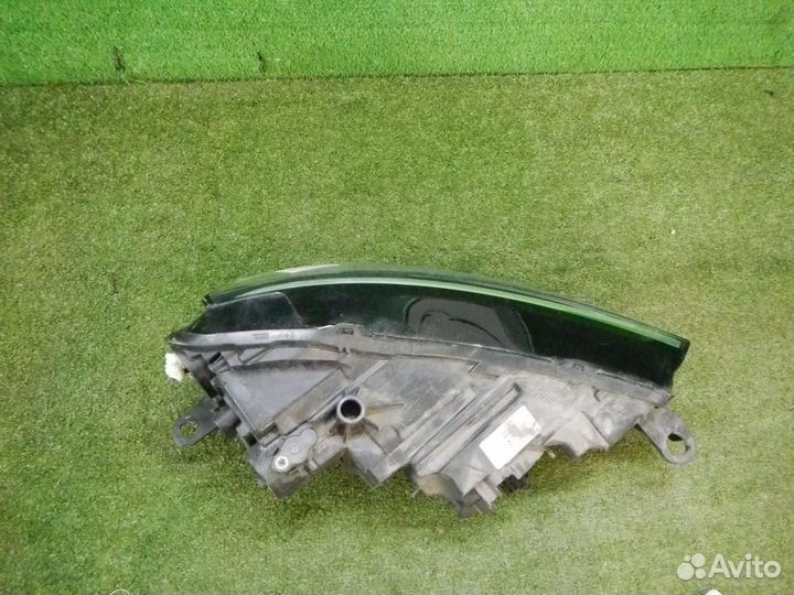 Фара левая Skoda Rapid