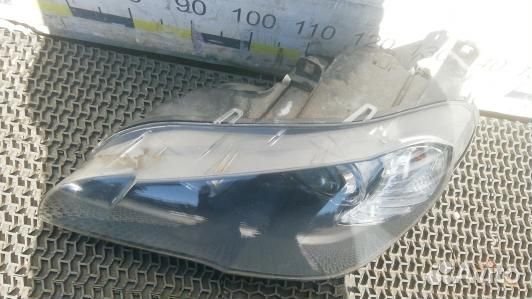 Фара левая BMW X5 E70 (1NT04MR01)