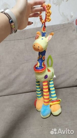 Игрушка на коляску