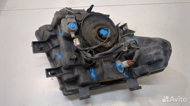 Фара (передняя) левая Nissan Navara