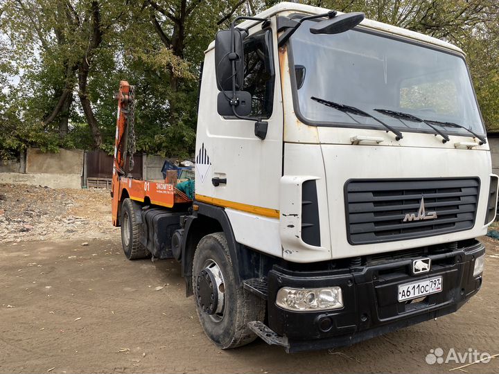 Маз 5550В2 бункеровоз-мусоровоз с кму