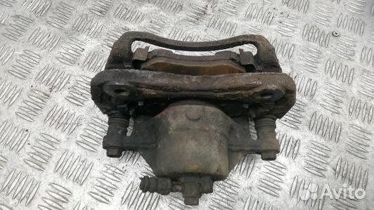 Суппорт тормозной передний левый KIA magentis MG