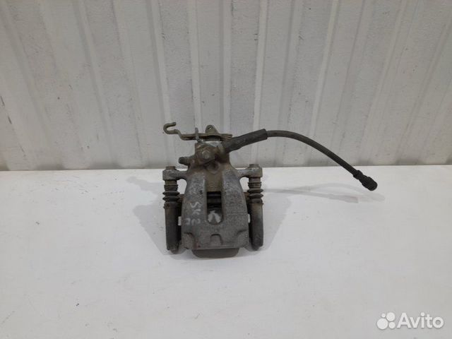 Суппорт тормозной задний правый в сборе Skoda