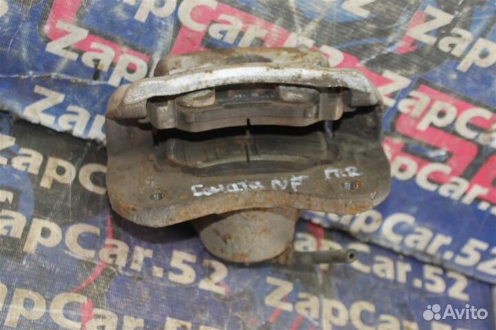 Суппорт передний правый Хендай Соната NF нф