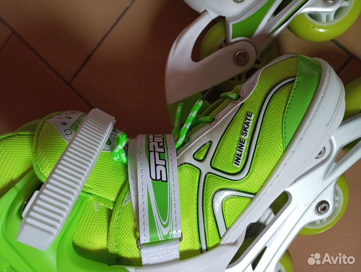 Роликовые коньки