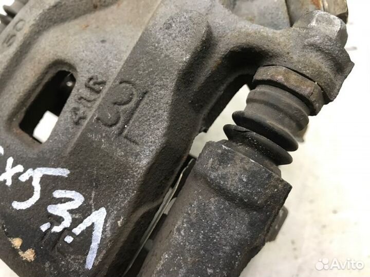 Суппорт тормозной задний левый Mazda Cx-5 KE