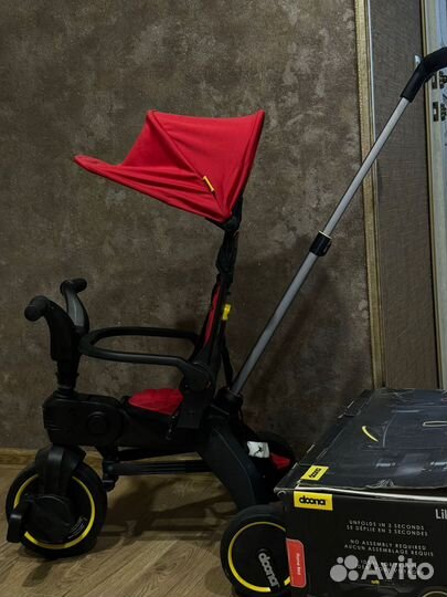 Детский велосипед с ручкой doona liki trike