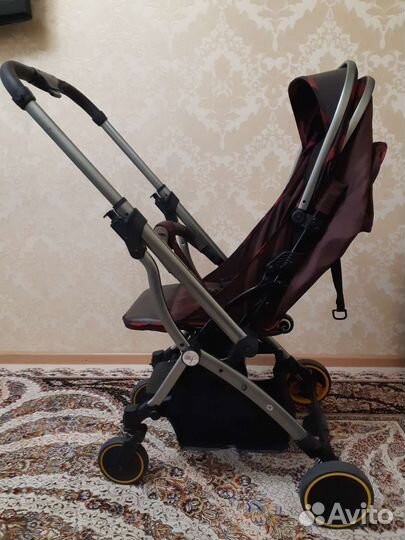 Детская прогулочная коляска с перекидной ручкой