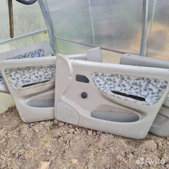 Обшивка двери Chery amuletа15