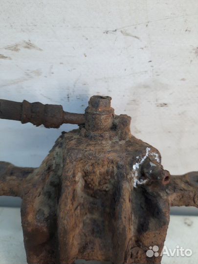 Суппорт тормозной задний левый Hyundai Santa Fe