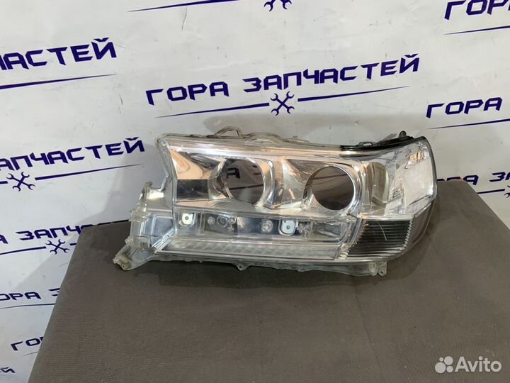 Стекло фары левое Toyota Land Cruiser 200