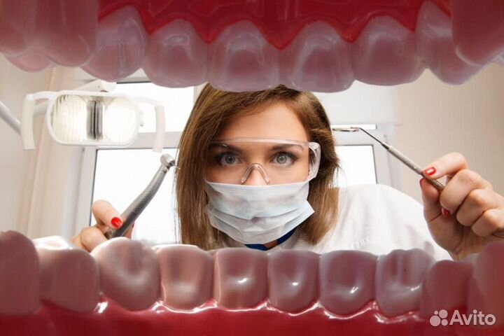 Врач стоматолог