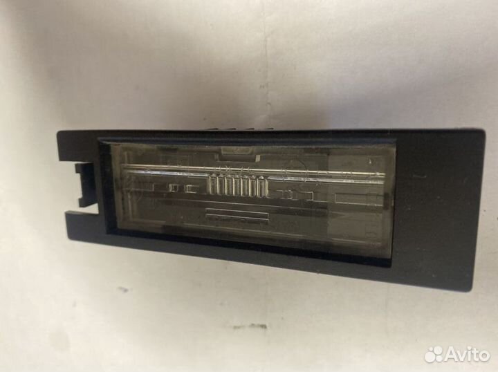 Фонарь подсветки номера Opel Astra J GTC 3D 1.4