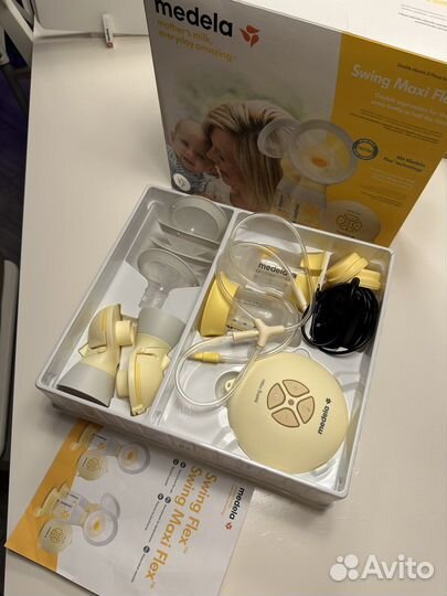 Молокоотсос medela swing maxi flex