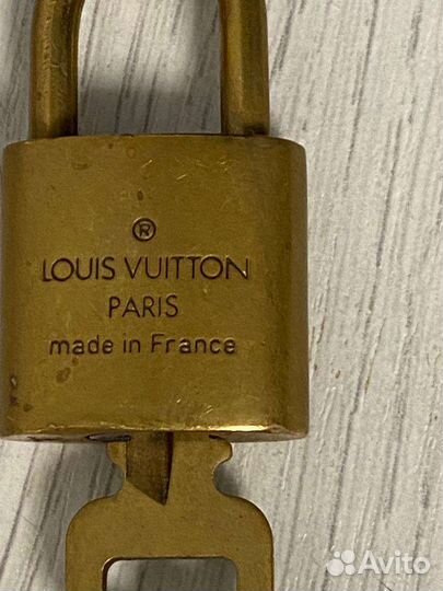 Замки louis vuitton и brioni
