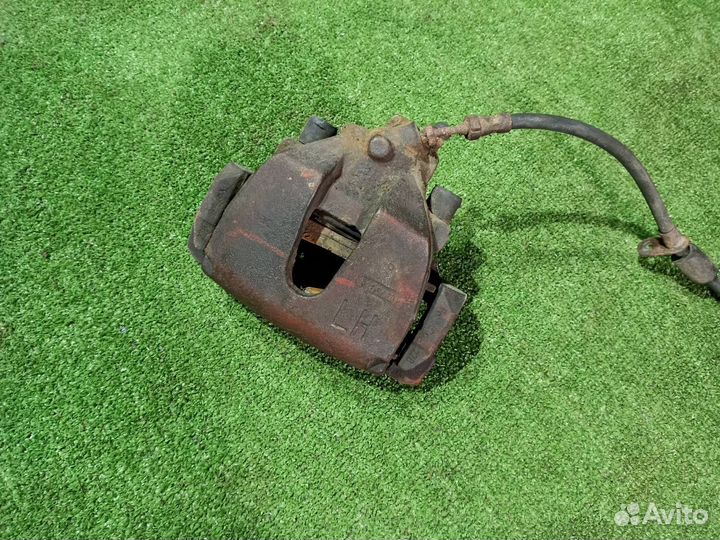 Тормозной суппорт передний левый Ford Focus 3