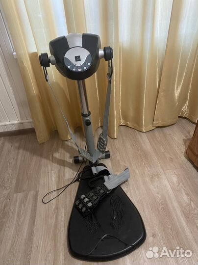 Вибромассажер на стойке тренажер