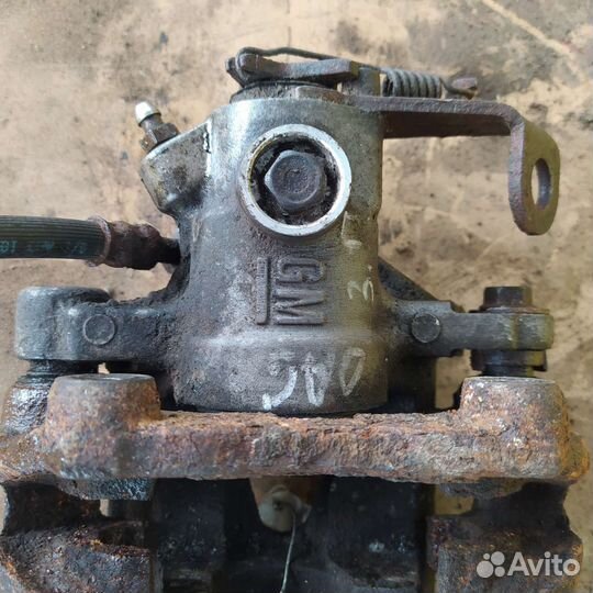 Суппорт задний opel astra g