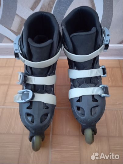 Роликовые коньки