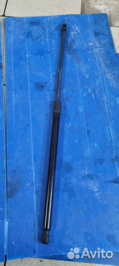 Амортизатор крышки багажника caddy