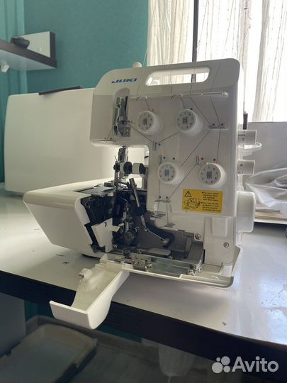 Оверлок juki mo 654den