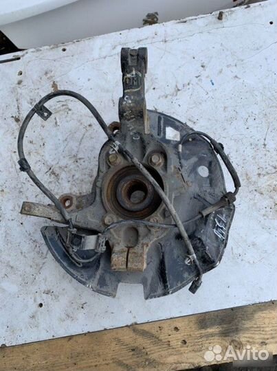 Кулак передний левый Hyundai Santa Fe 3