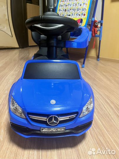 Машинка каталка с ручкой