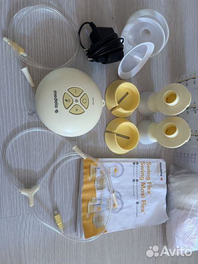 Молокоотсос medela электрический