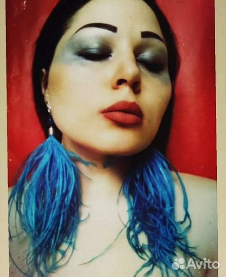 Серьги с перьями