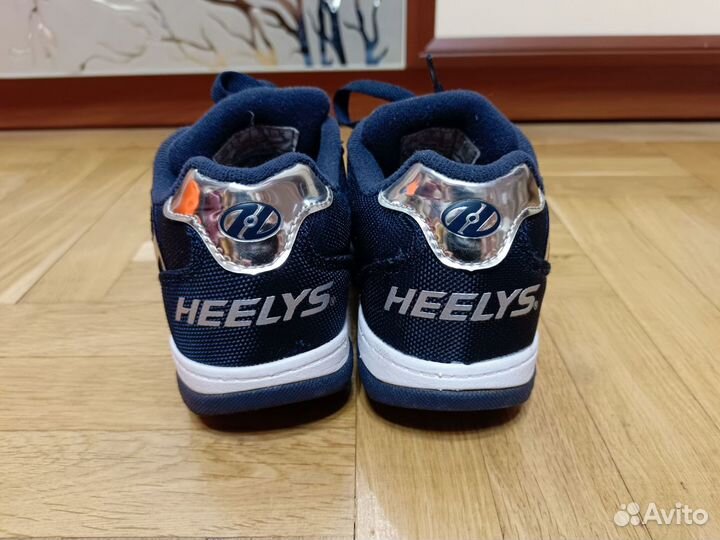 Роликовые кроссовки Heelys