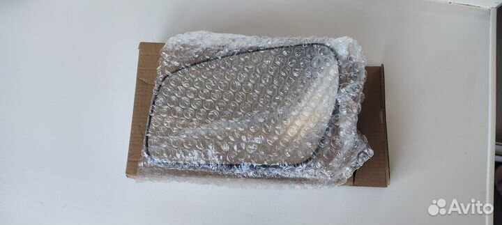 Стекло зеркала левого c подогревом на Ford Focus