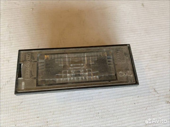 Фонарь подсветки номера Renault Megane