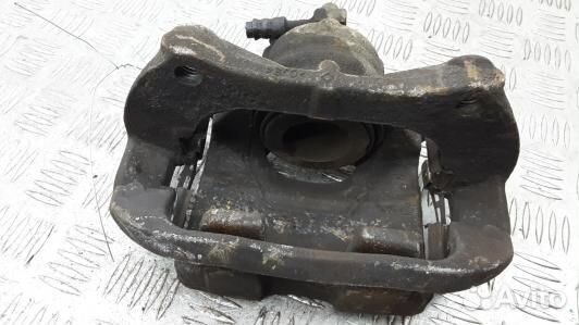 Суппорт тормозной передний правый opel astra J (7B