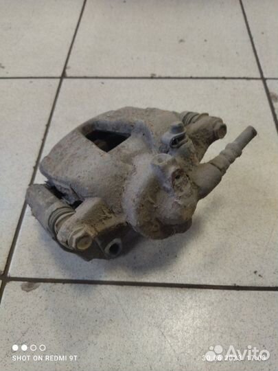 Суппорт тормозной передний правый Fiat Albea