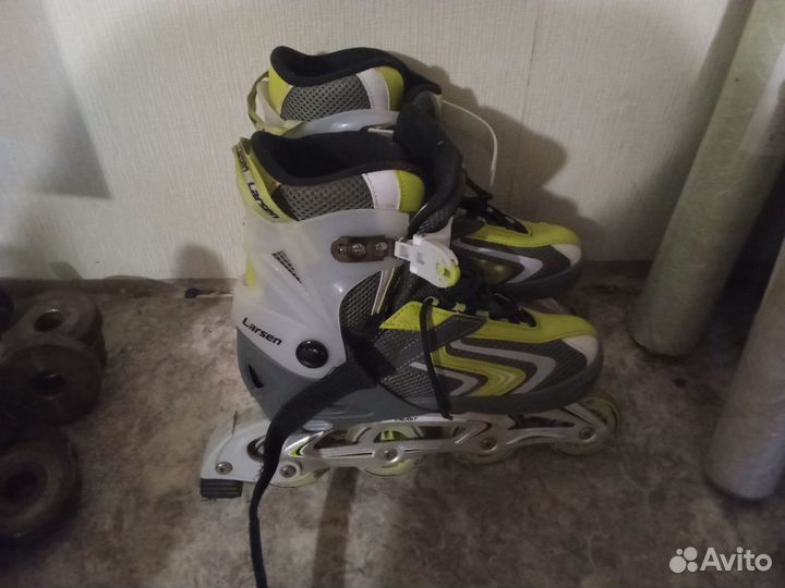 Роликовые коньки