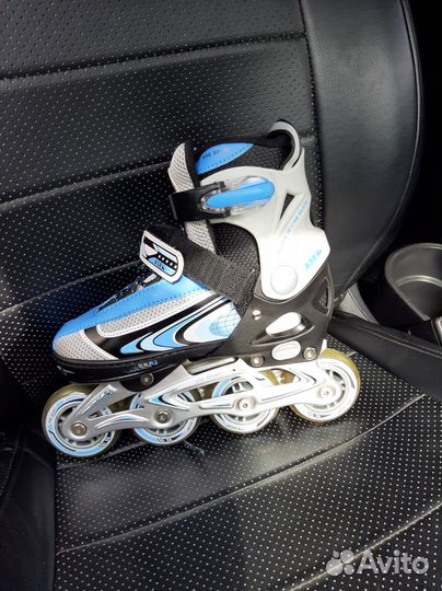 Роликовые коньки