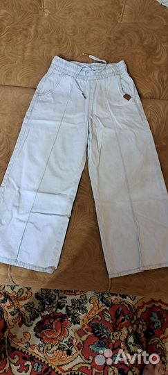 Джинсы широкие