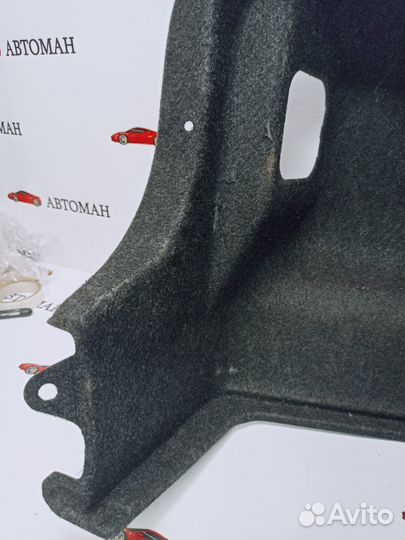 Обшивка багажника левая Toyota Corolla E150