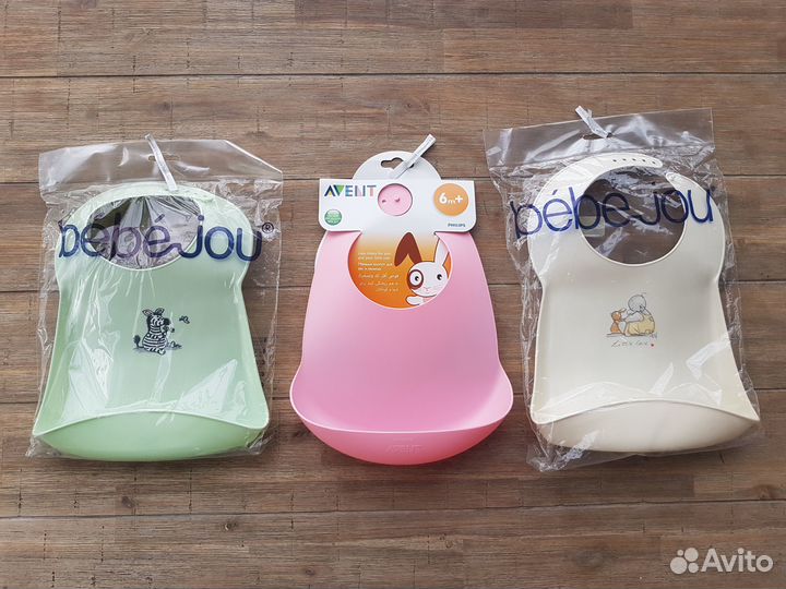 Нагрудник пеликан из пластика с карманом 1 шт