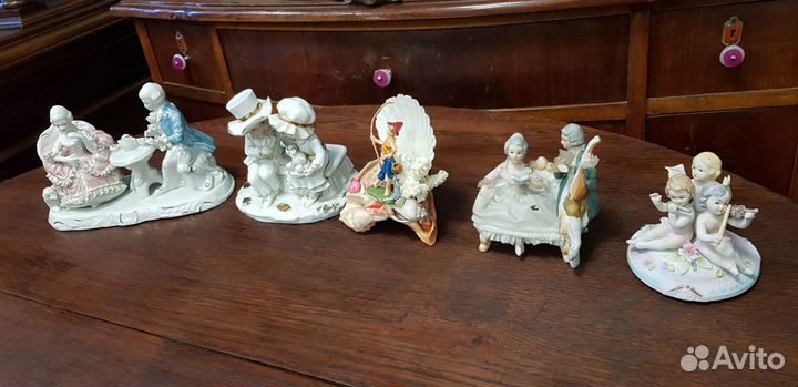 Фарфоровые статуэтки Путти с уточкой