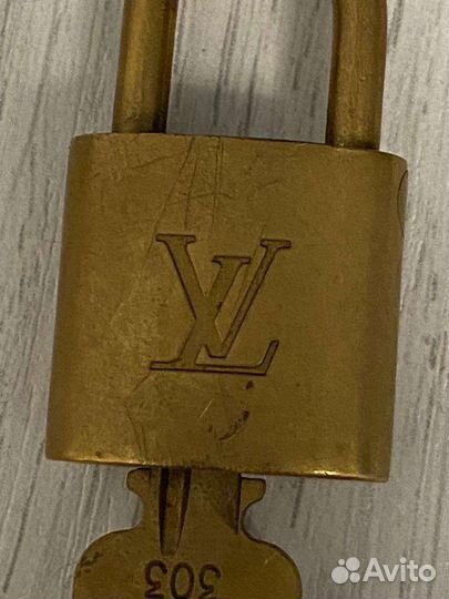 Замки louis vuitton и brioni