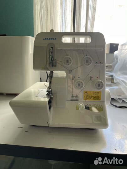 Оверлок juki mo 654den