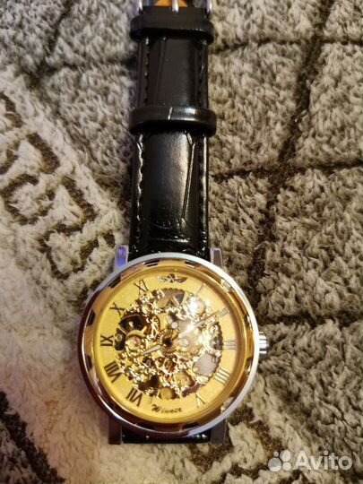 Новые часы скелетоны с маятником