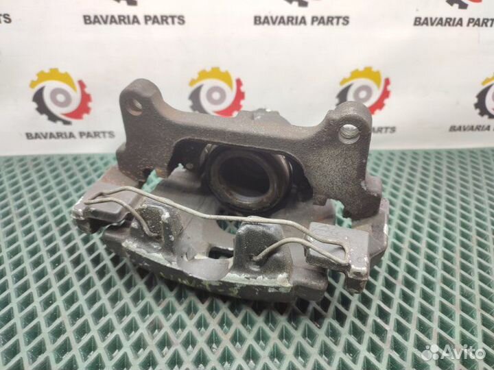 Суппорт тормозной передний правый Volkswagen